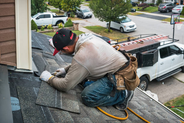 Professional Roofing technician working in Harvey, ND